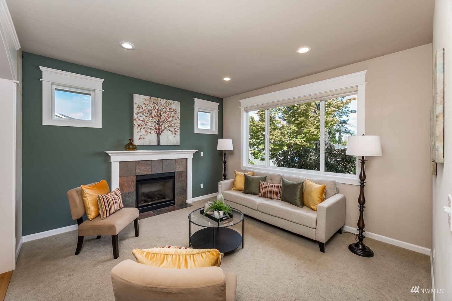 24222 23rd Avenue Southeast Bothell, WA 98021 - Photo 12 of 40 a living room with furniture and a fireplace