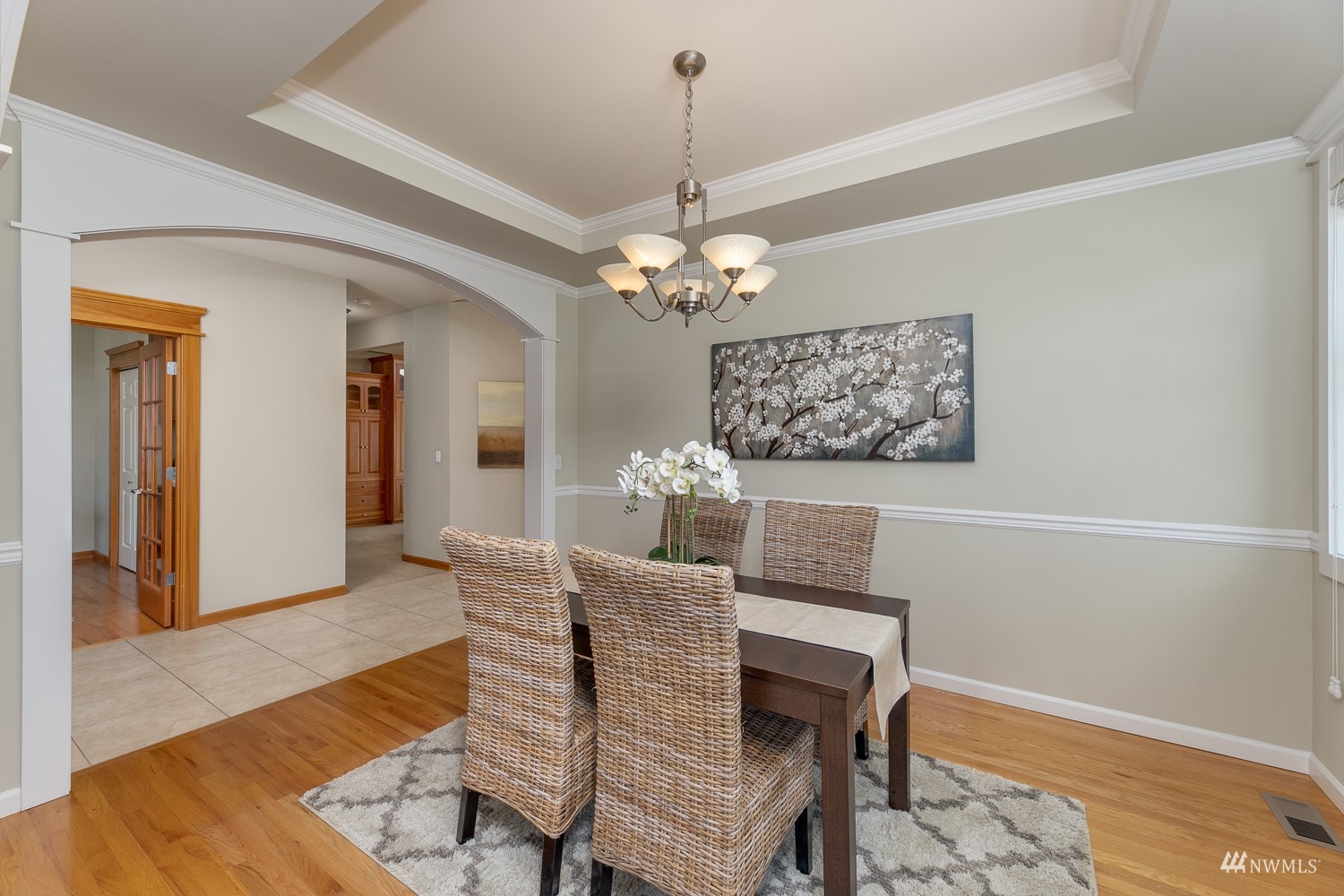 24222 23rd Avenue Southeast Bothell, WA 98021 - Photo 14 of 40 a dining room with furniture and chandelier
