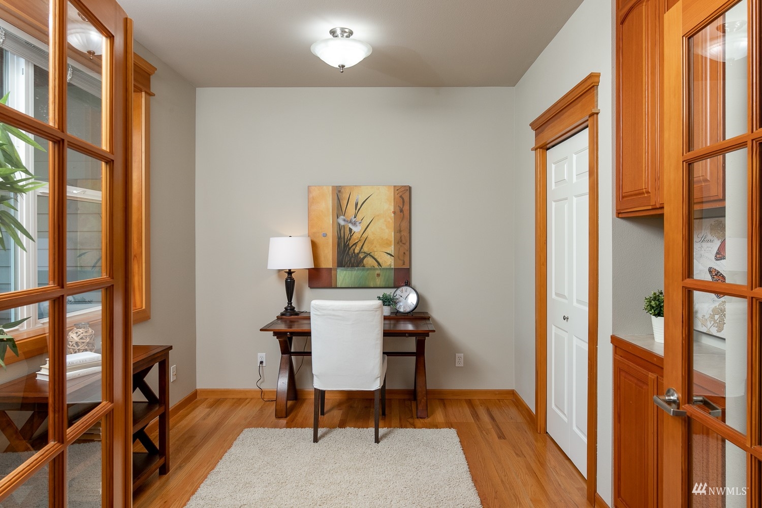 24222 23rd Avenue Southeast Bothell, WA 98021 - Photo 16 of 40 a view of a workspace with furniture and a window