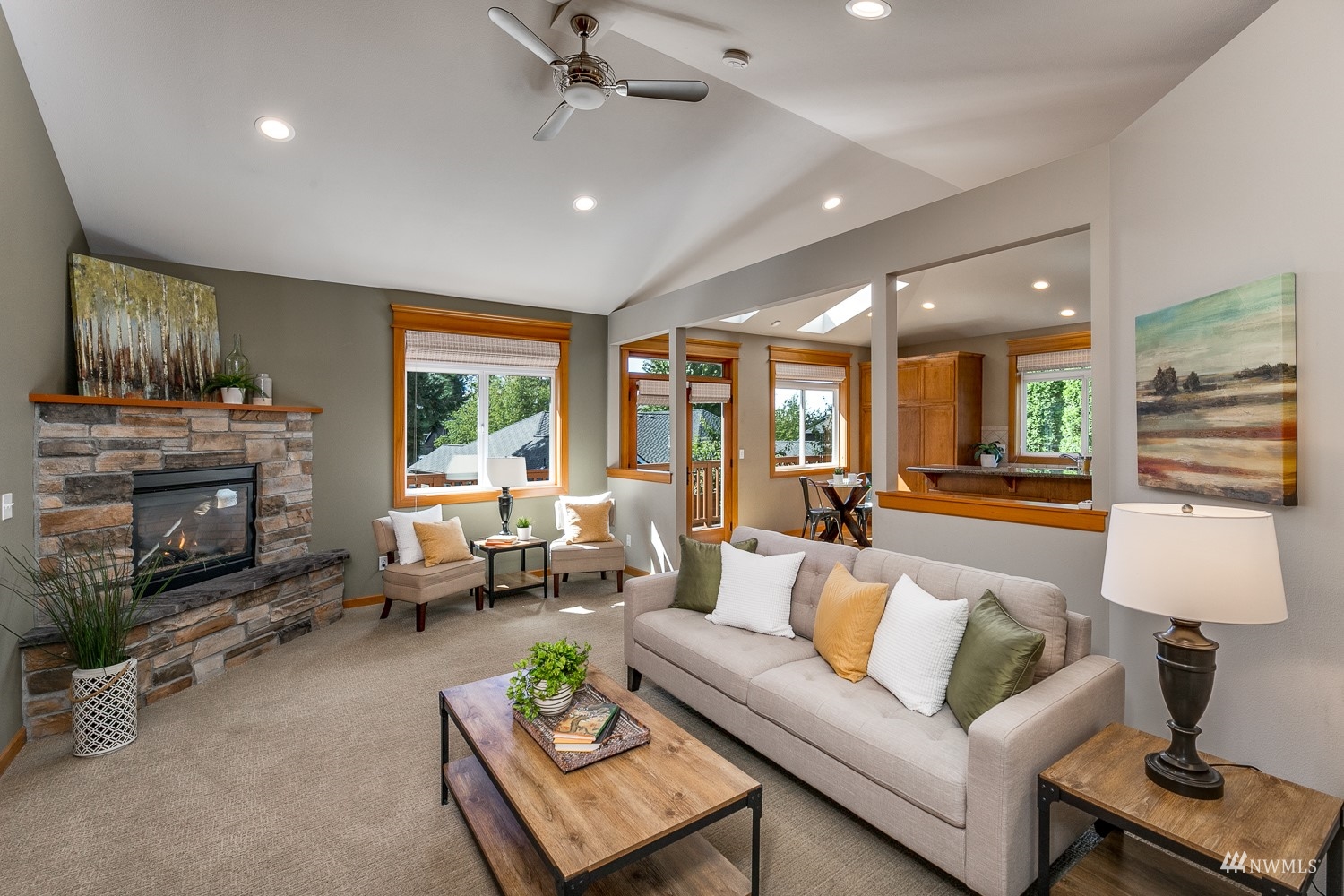 24222 23rd Avenue Southeast Bothell, WA 98021 - Photo 24 of 40 a living room with furniture and a fireplace