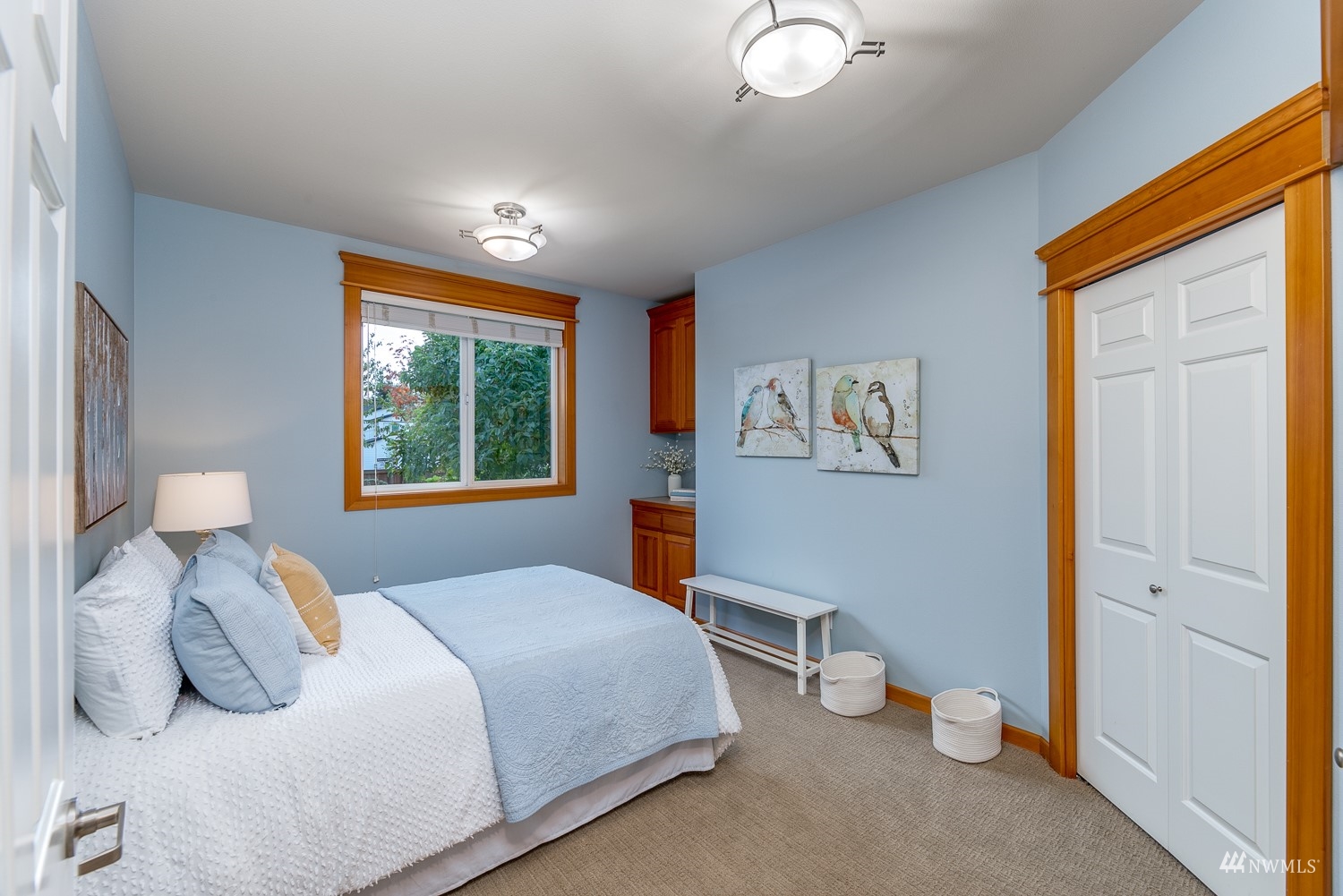 24222 23rd Avenue Southeast Bothell, WA 98021 - Photo 31 of 40 a bedroom with a bed and a window