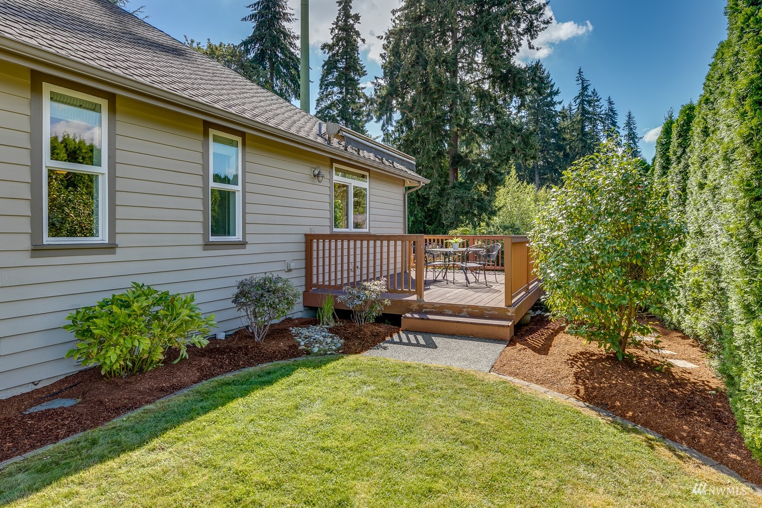 24222 23rd Avenue Southeast Bothell, WA 98021 - Photo 40 of 40 a view of a house with a yard and sitting area