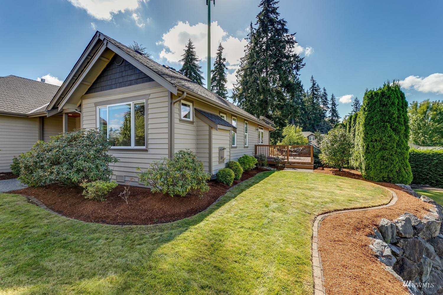 24222 23rd Avenue Southeast Bothell, WA 98021 - Photo 6 of 40 a view of a house with backyard and sitting area
