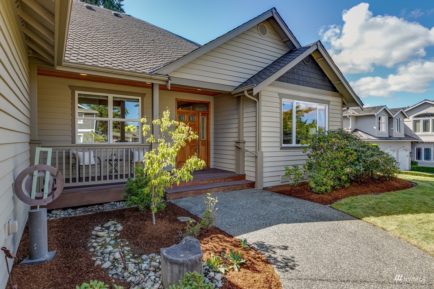 24222 23rd Avenue Southeast Bothell, WA 98021 - Photo 7 of 40 a front view of house with a garden