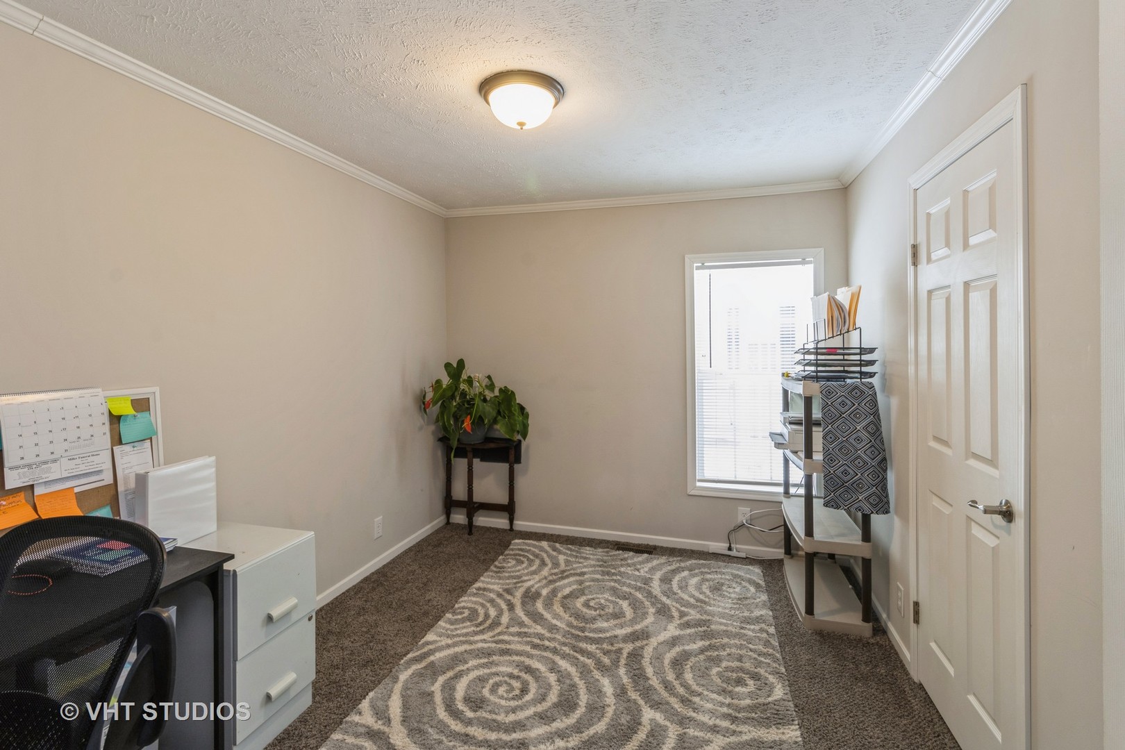 205 Tollview Road Elgin, IL 60123 - Photo 12 of 19 a bedroom with a bed and a window