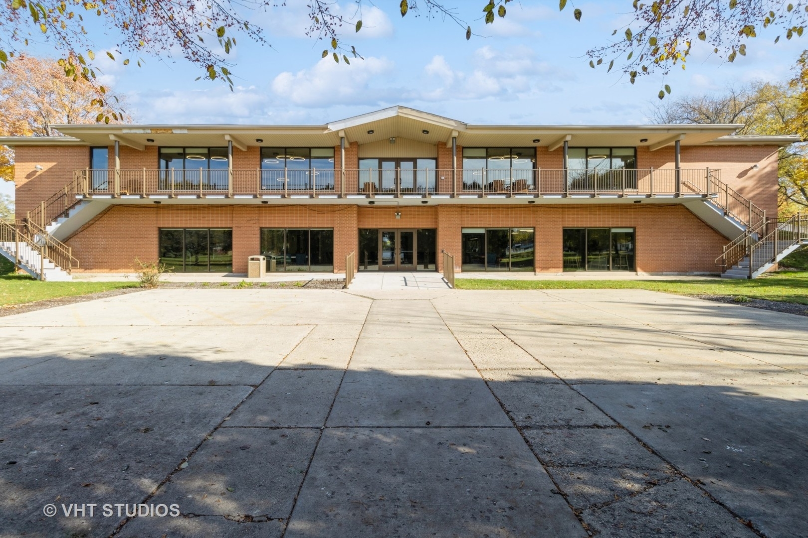 205 Tollview Road Elgin, IL 60123 - Photo 18 of 19 a view of a building with a outdoor space