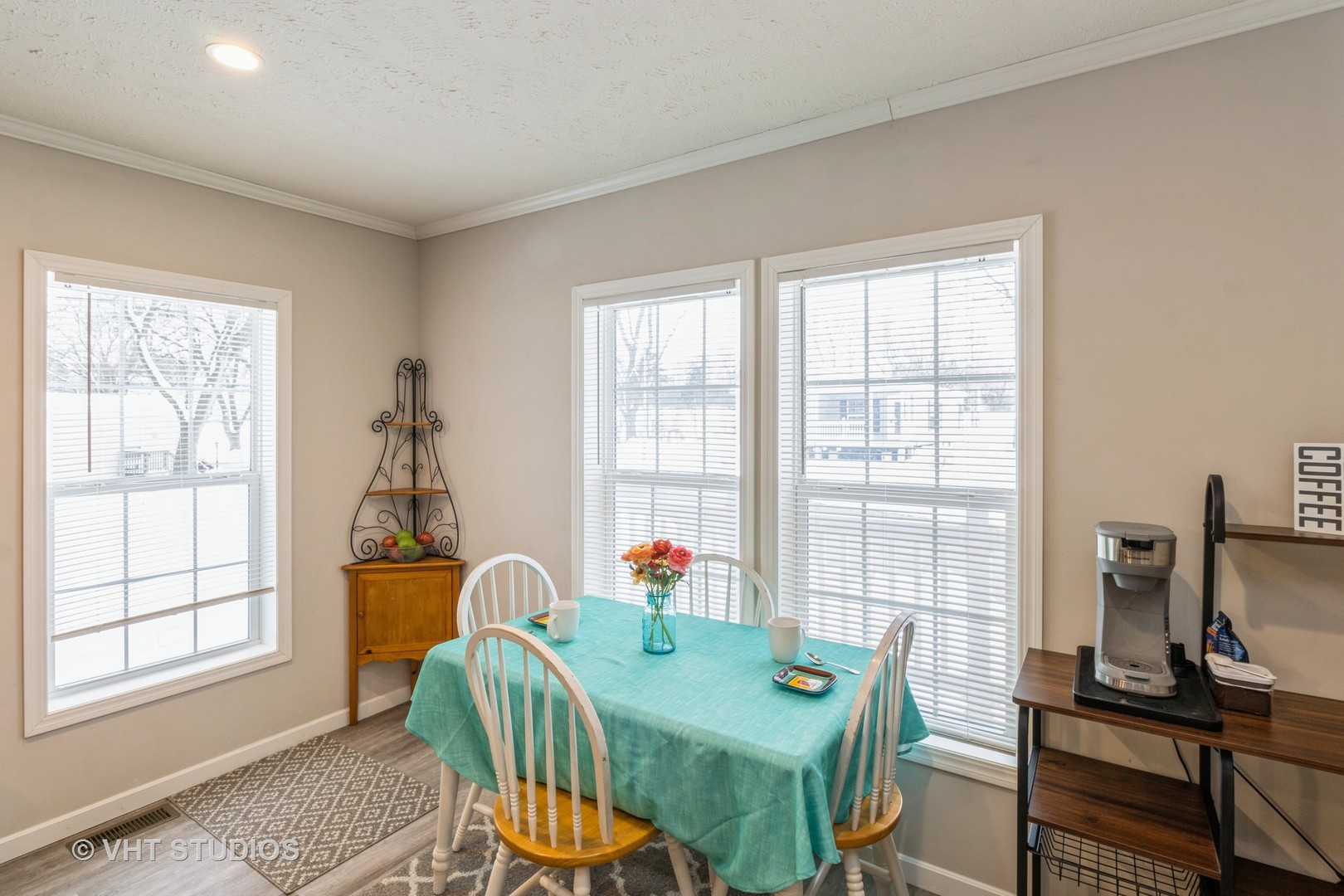 205 Tollview Road Elgin, IL 60123 - Photo 5 of 19 a living room with furniture a window and a flat screen tv