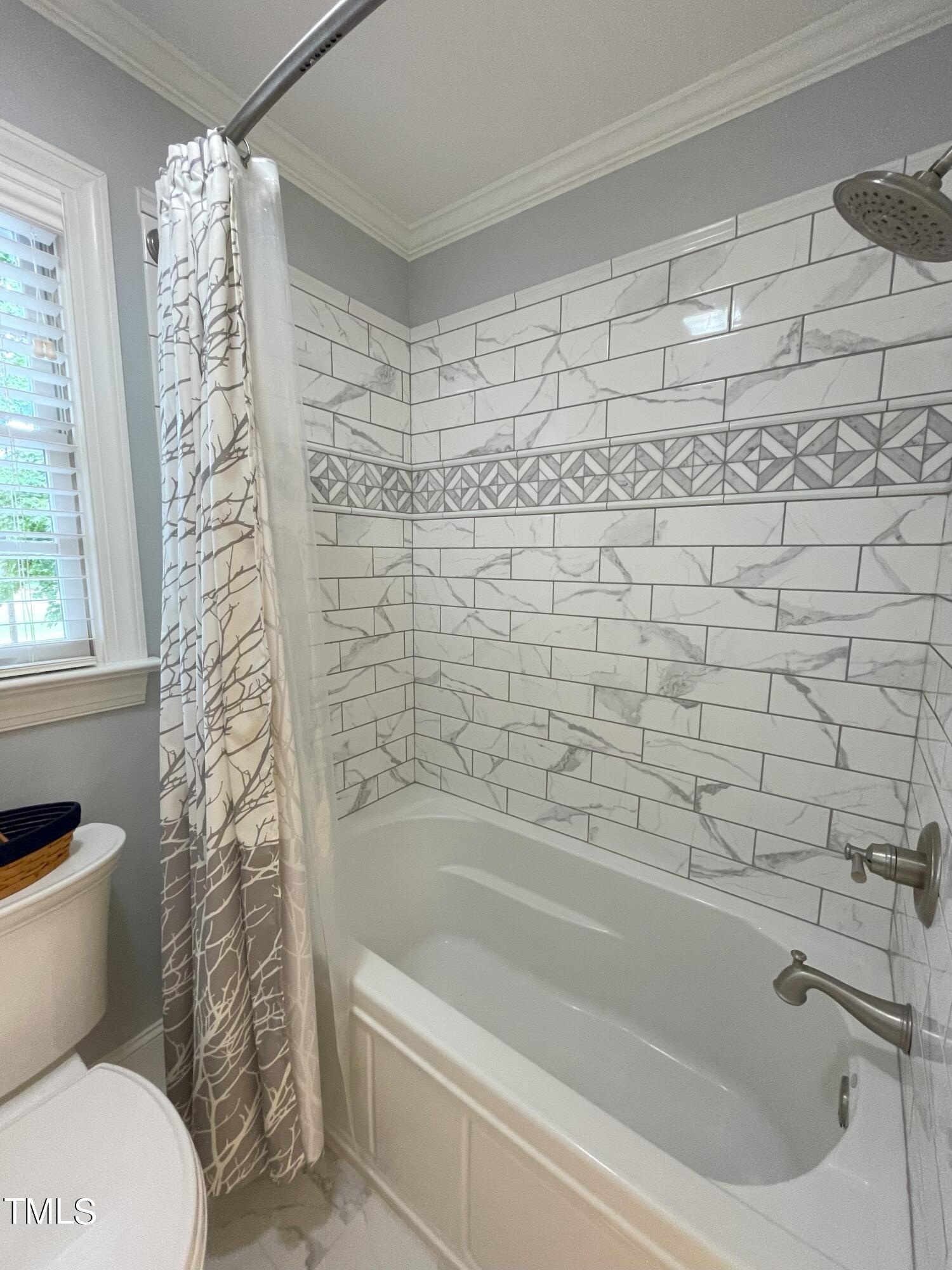 3033 Pearces Road Zebulon, NC 27597 - Photo 33 of 42 36_Bathroom_upstairs hallway_showcases t