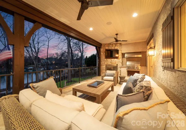a view of a living room and balcony