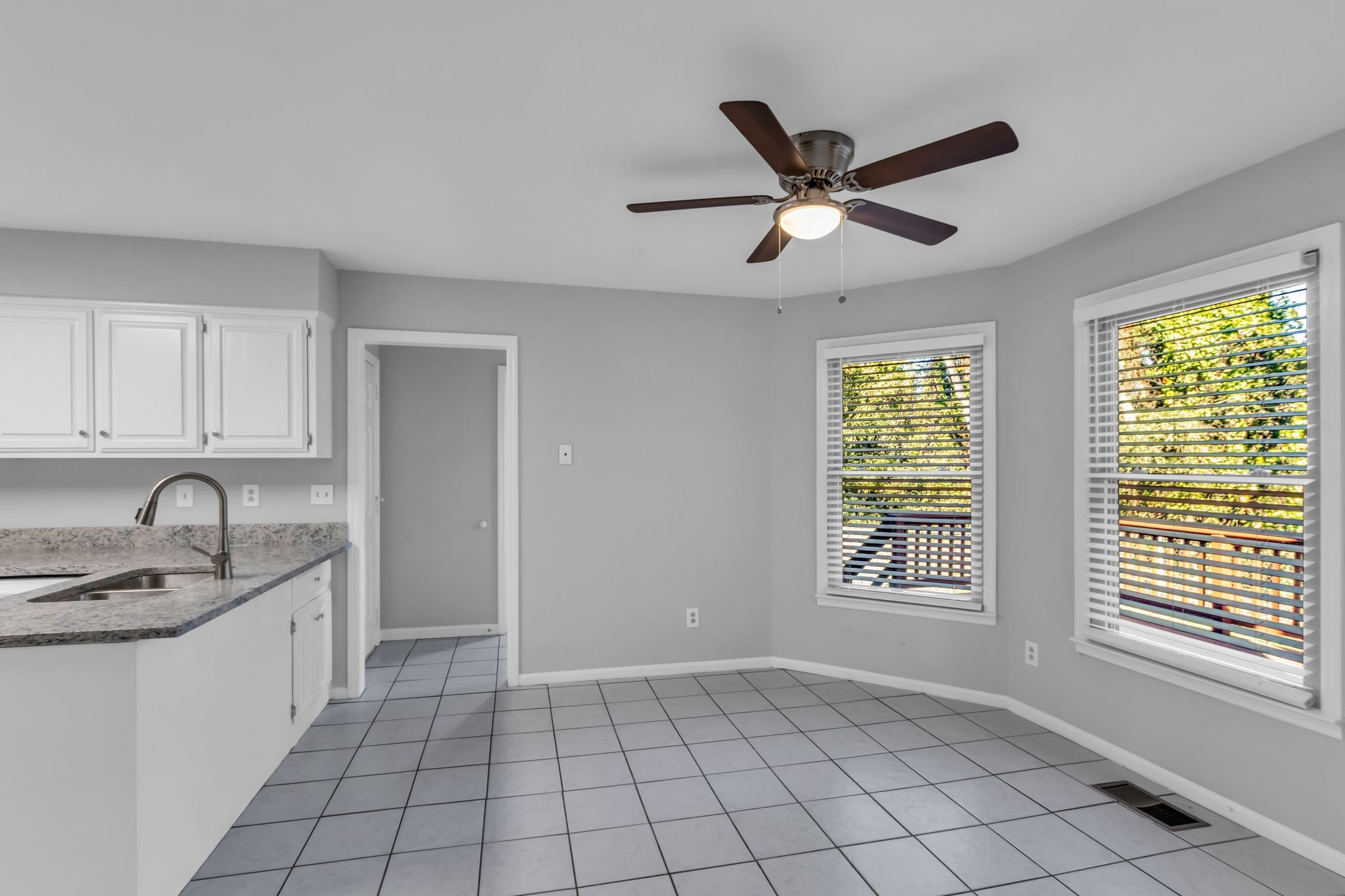 2560 Choctaw Trace Murfreesboro, TN 37129 - Photo 11 of 36 a kitchen with windows cabinets a sink and a window