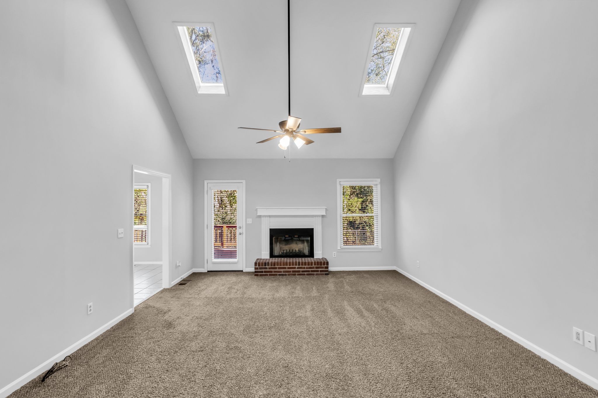 2560 Choctaw Trace Murfreesboro, TN 37129 - Photo 17 of 36 an empty room with windows and fireplace