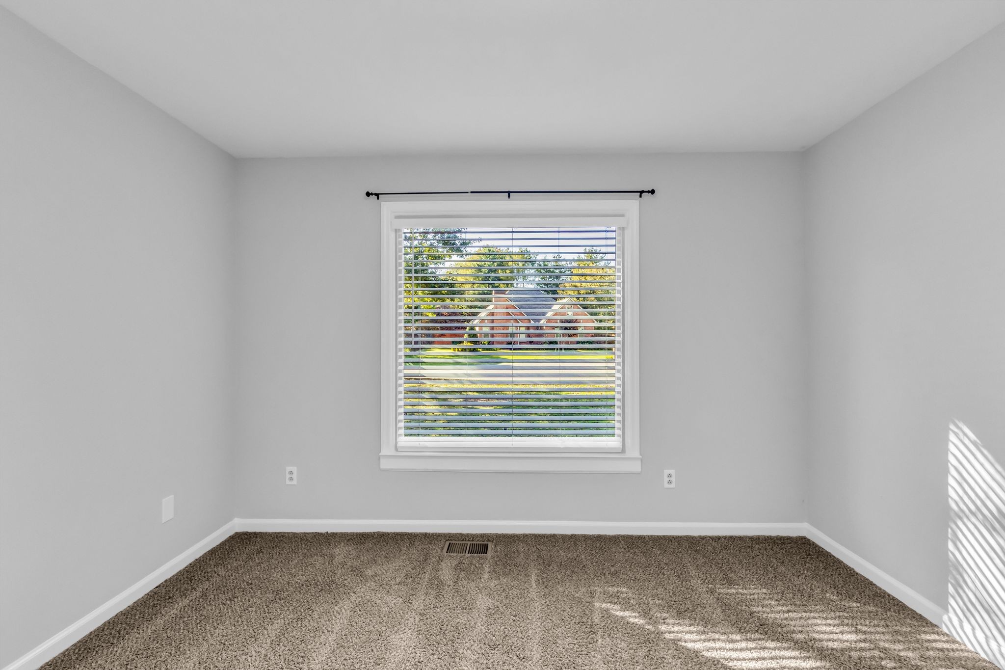 2560 Choctaw Trace Murfreesboro, TN 37129 - Photo 26 of 36 a view of an empty room with wooden floor and a window