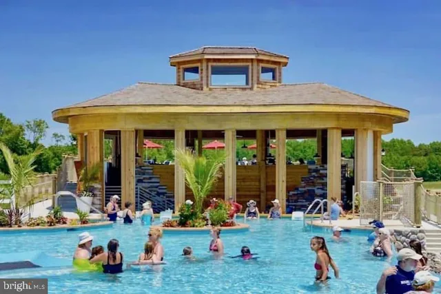 a front view of retail shop with outdoor seating