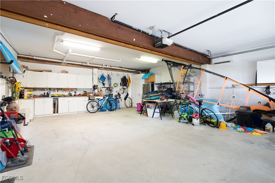 8550 Ebbtide Way Bokeelia, FL 33922 - Photo 33 of 50 a view of a garage with rack and bicycle