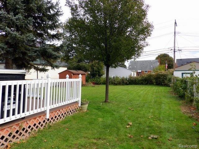 7911 Merrick Street Taylor, MI 48180 - Photo 5 of 42 05. FENCED YARD ~ PLENTY OF ROOM FOR THE KIDS TO PLAY AND DOGS TO RUN!