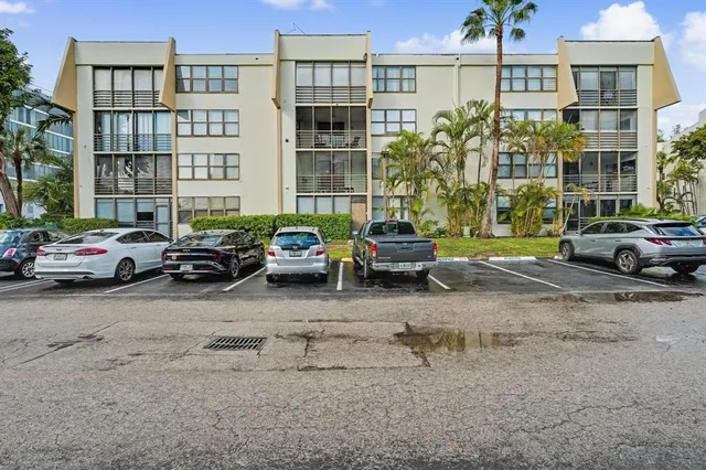 a cars parked in front of a building