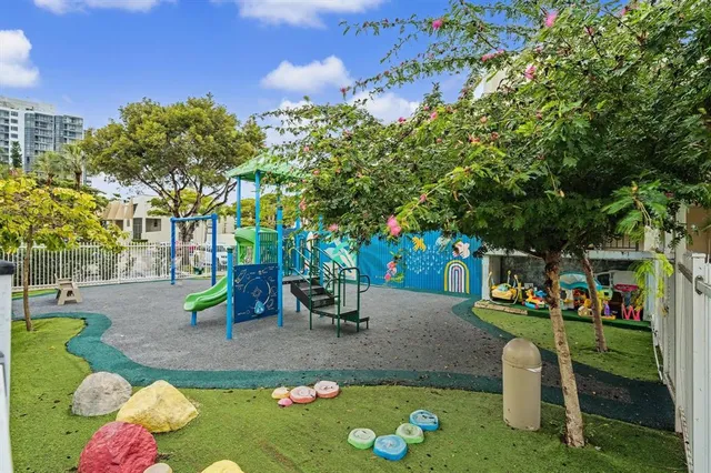 a view of a table and chairs in a patio