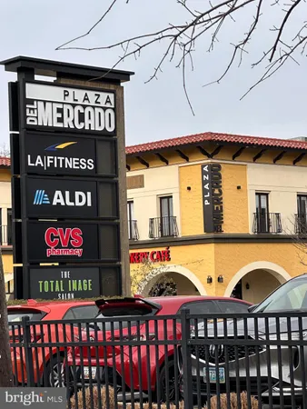 a view of a street with an outdoor seating