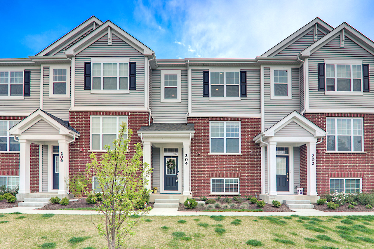 front view of house with a yard