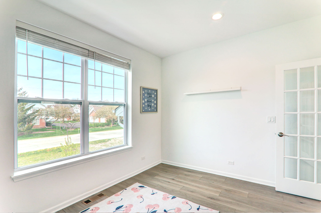 204 Timberleaf Circle Roselle, IL 60172 - Photo 11 of 22 an empty room with a window