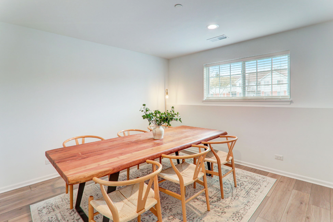 204 Timberleaf Circle Roselle, IL 60172 - Photo 13 of 22 a dining room with a table and chairs