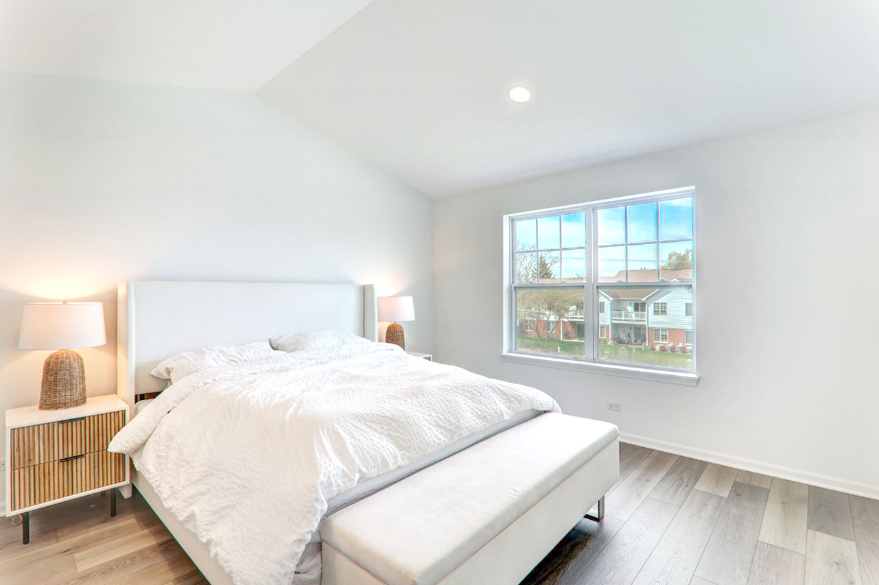 204 Timberleaf Circle Roselle, IL 60172 - Photo 15 of 22 a bedroom with a bed and a window