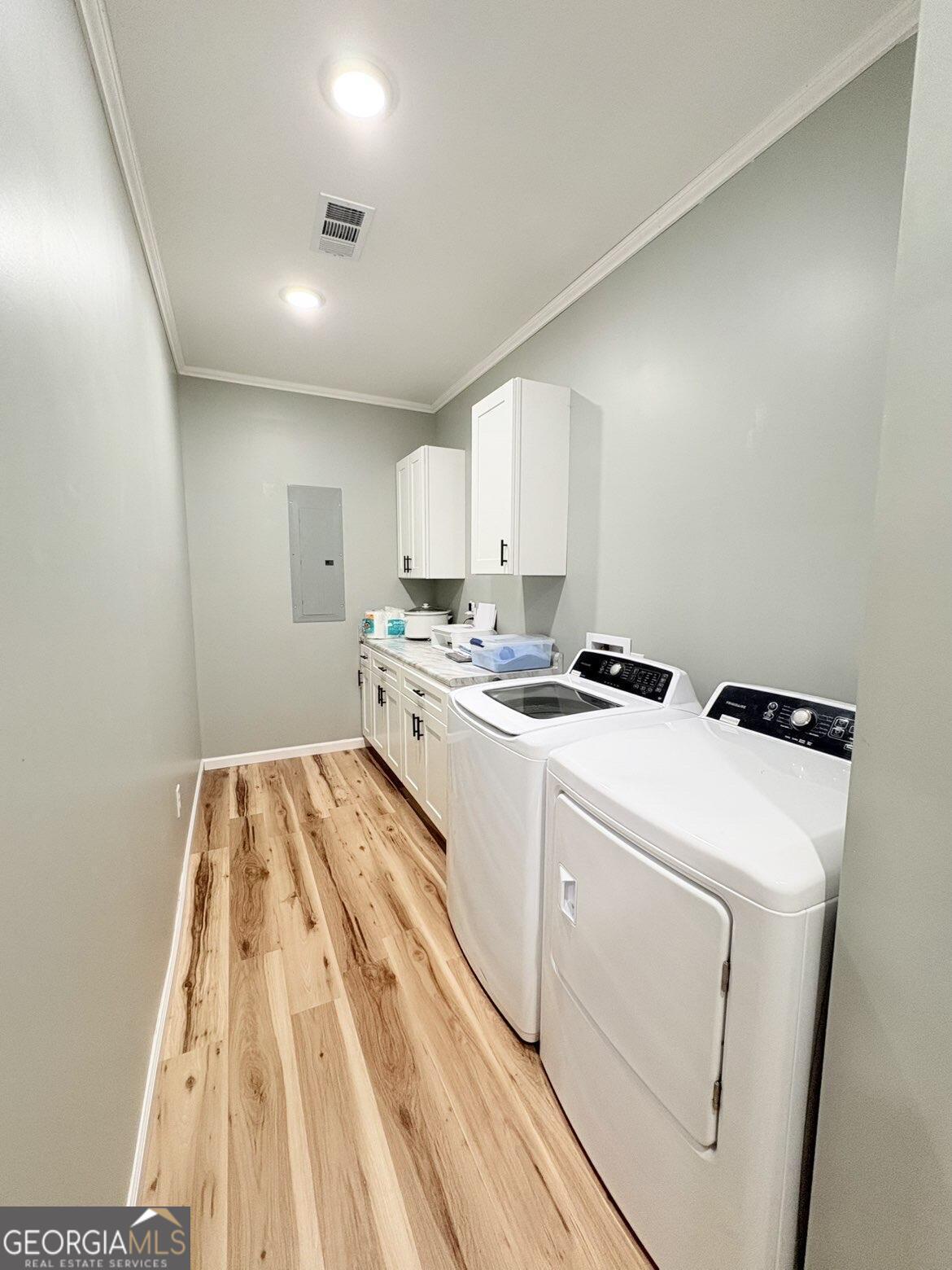 210 St Galilee Road Swainsboro, GA 30401 - Photo 17 of 18 a room with storage and utility