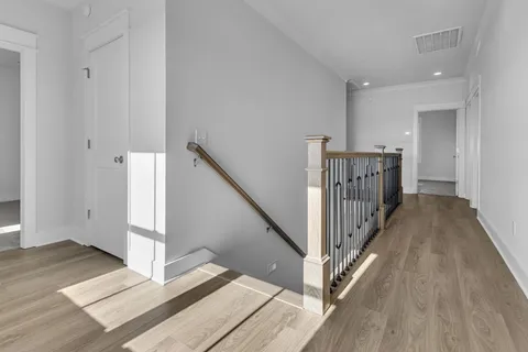 a white bath tub sitting next to a white toilet