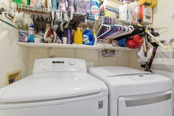 a utility room with dryer and washer