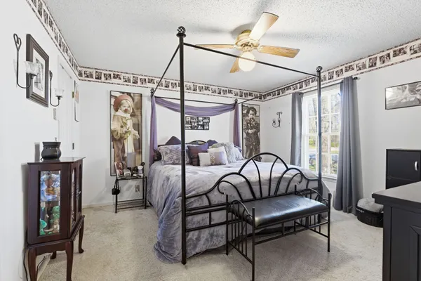 a bedroom with furniture