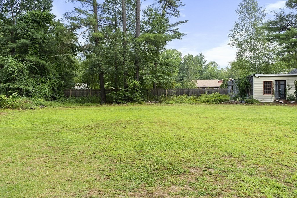 25 Warren Road Townsend, MA 01469 - Photo 33 of 42 a backyard of a house with yard and tree