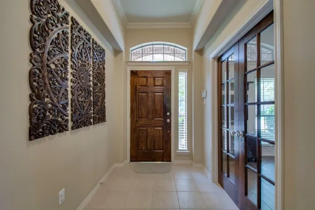 a view of an entryway with a hallway