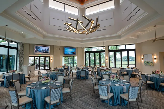 a swimming pool with outdoor seating and yard