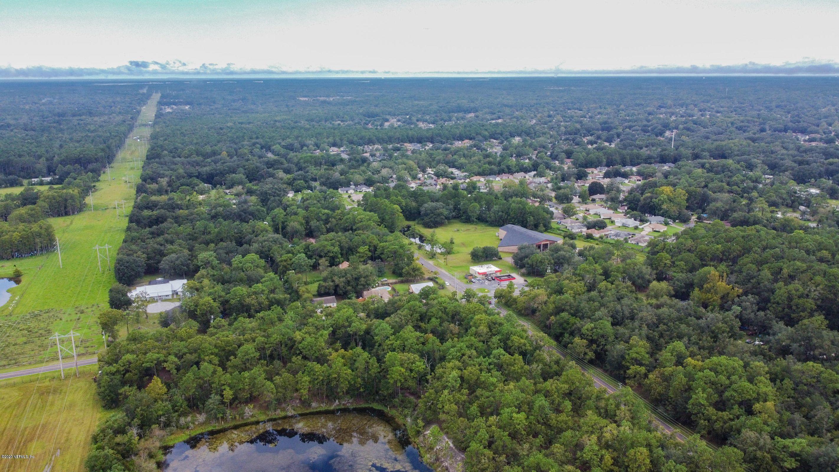 0 Ricker Road Jacksonville, FL 32244 - Photo 6 of 11 an aerial view of a house with a yard