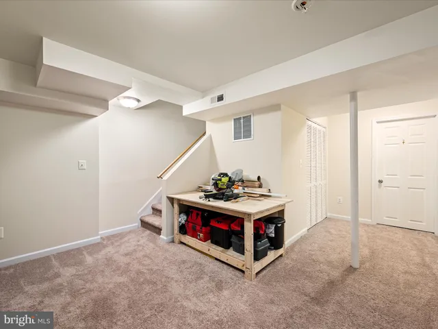 a room with furniture and storage