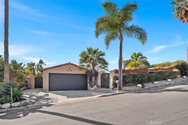 a view of a house with a garage