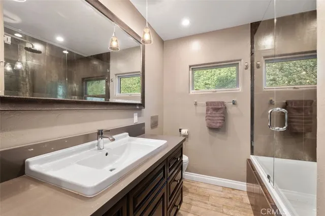 a view of a hallway with washer and dryer