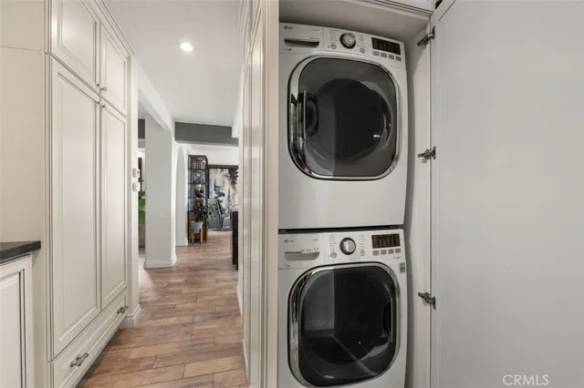 a view of a patio with table and chairs and potted plants