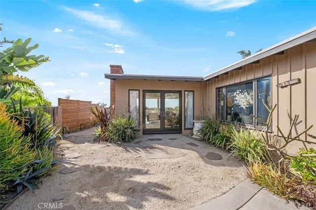 an aerial view of beach and ocean