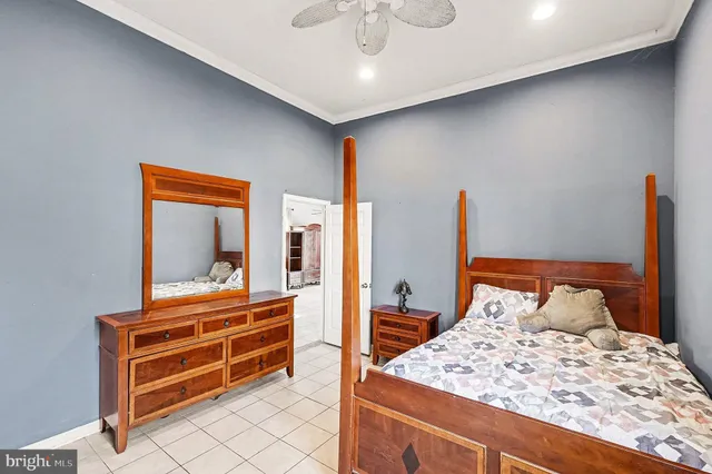 a kitchen with stainless steel appliances granite countertop a refrigerator a stove and a sink