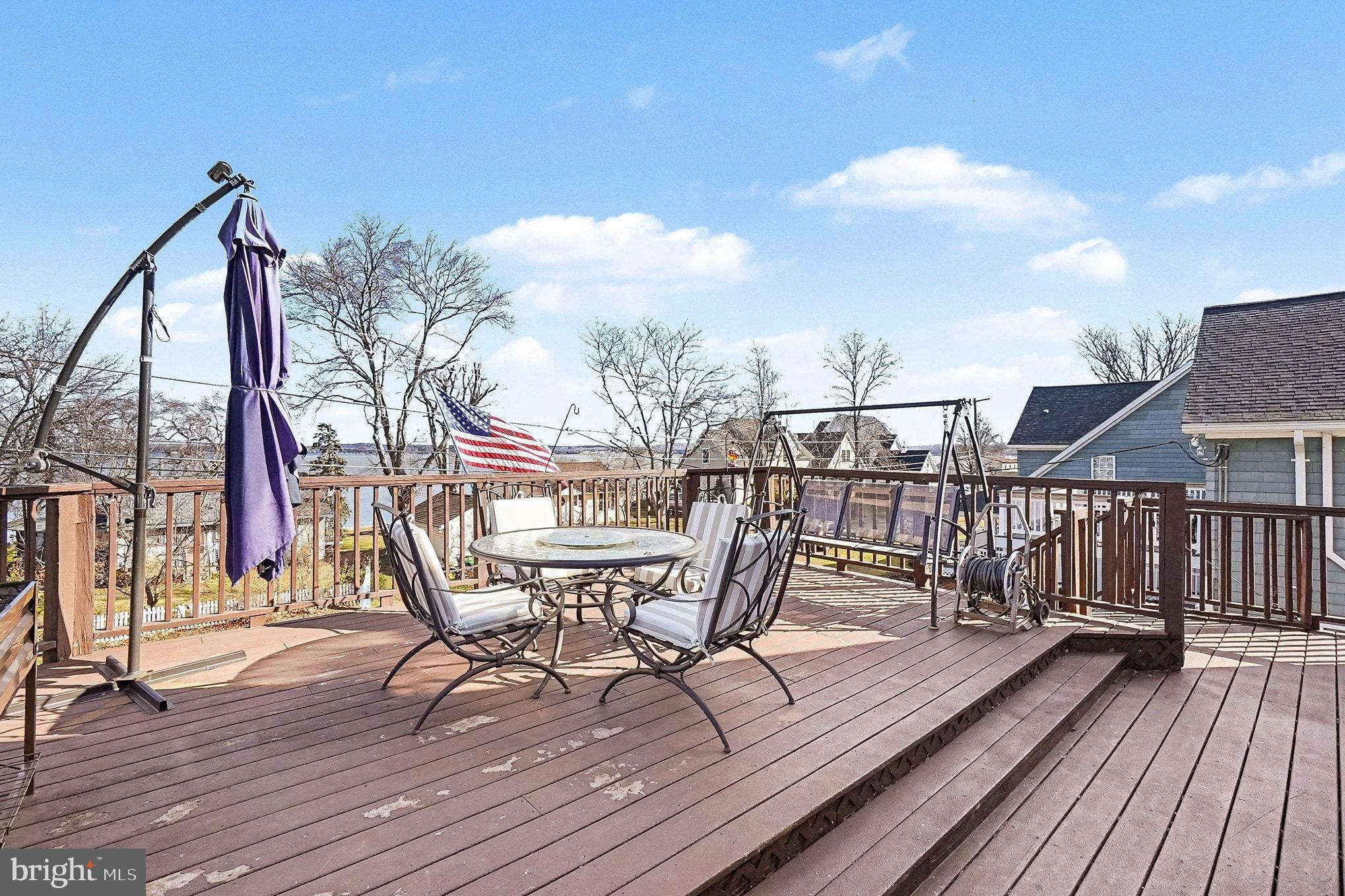 8 Cherry Lane Perryville, MD 21903 - Photo 4 of 57 a view of a roof deck with table and chairs