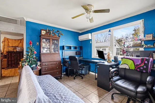 a bedroom with bed and a lamp