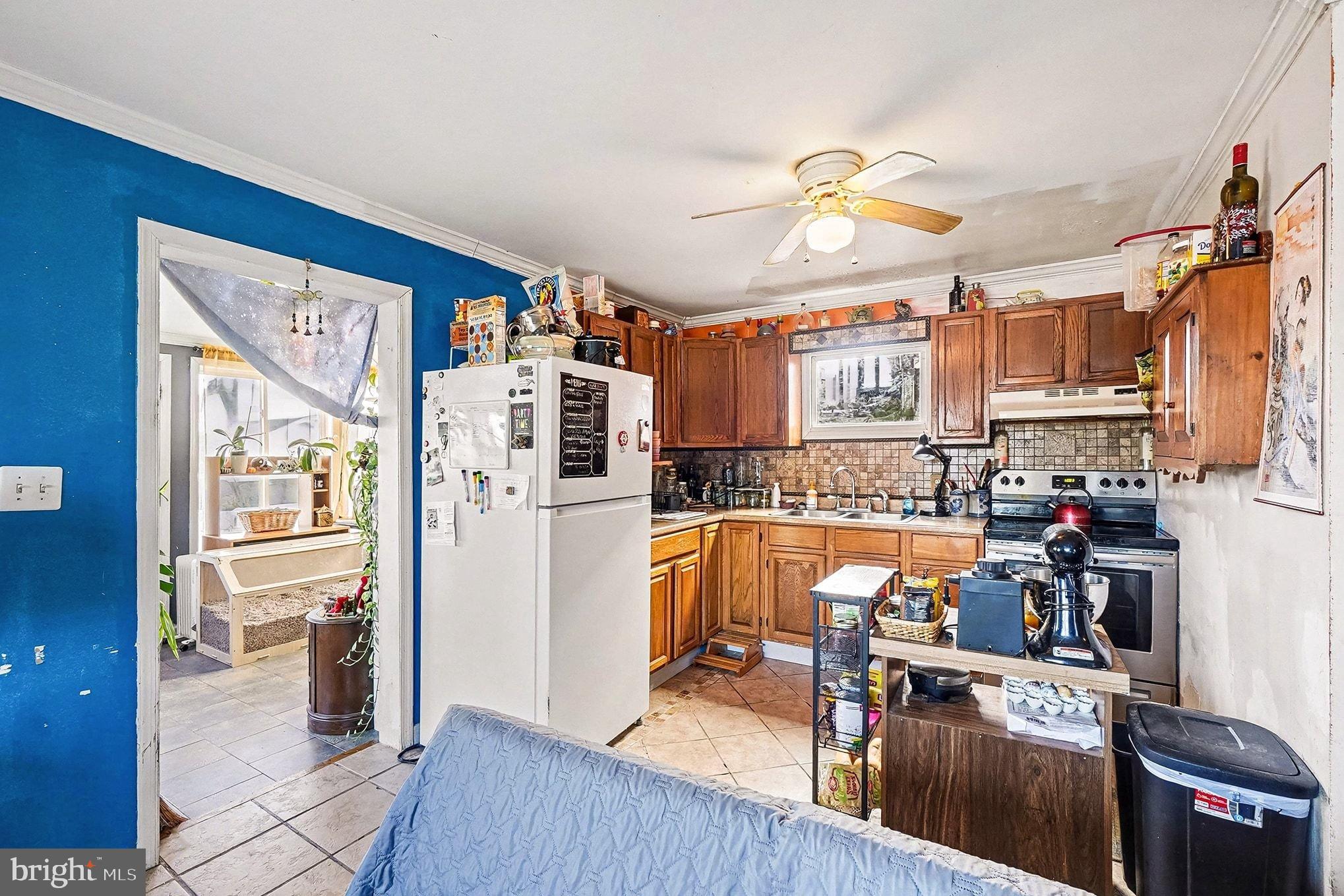 8 Cherry Lane Perryville, MD 21903 - Photo 45 of 57 a kitchen with stainless steel appliances granite countertop a refrigerator a stove and a sink