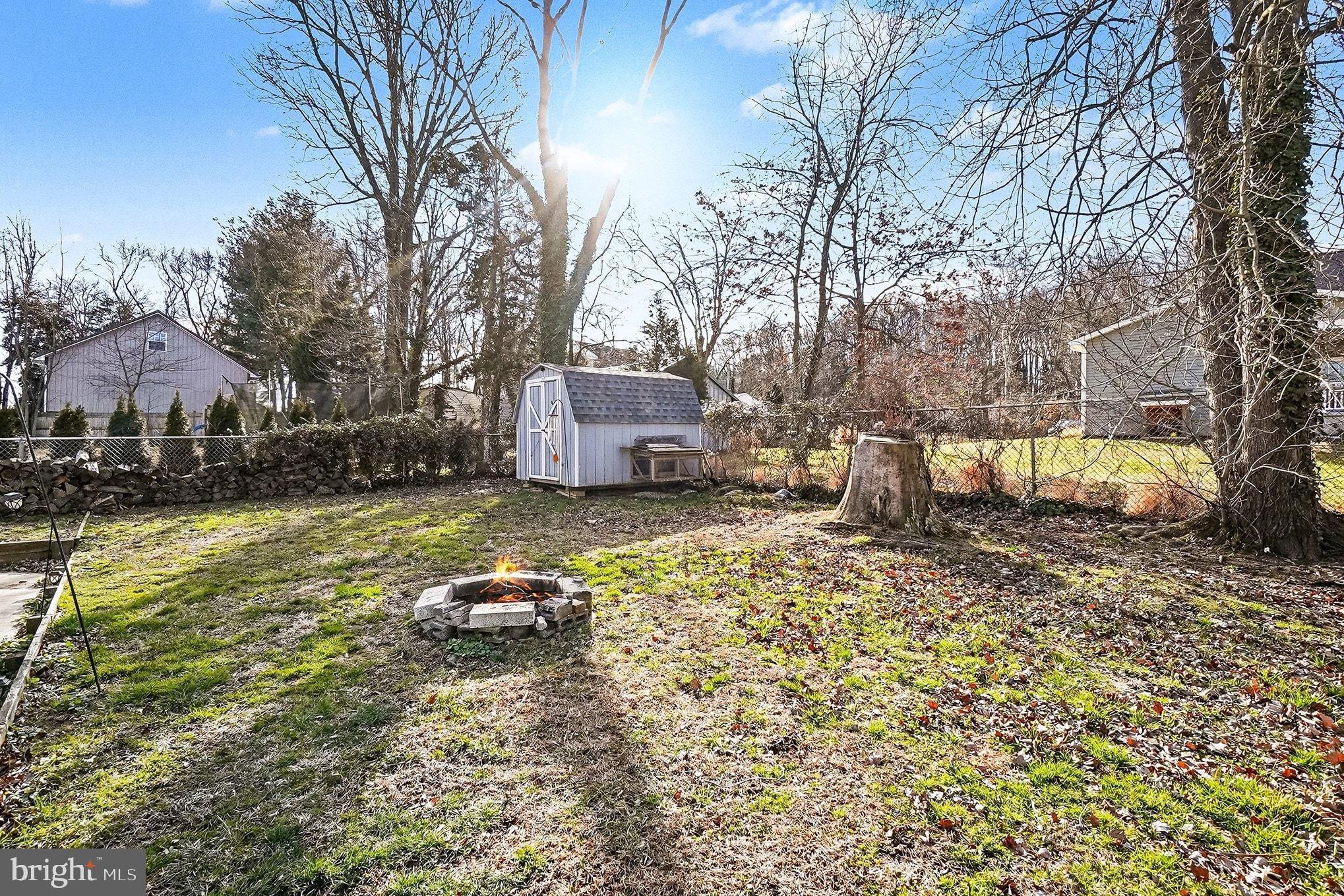 8 Cherry Lane Perryville, MD 21903 - Photo 50 of 57 a backyard of a house with barbeque oven table and chairs