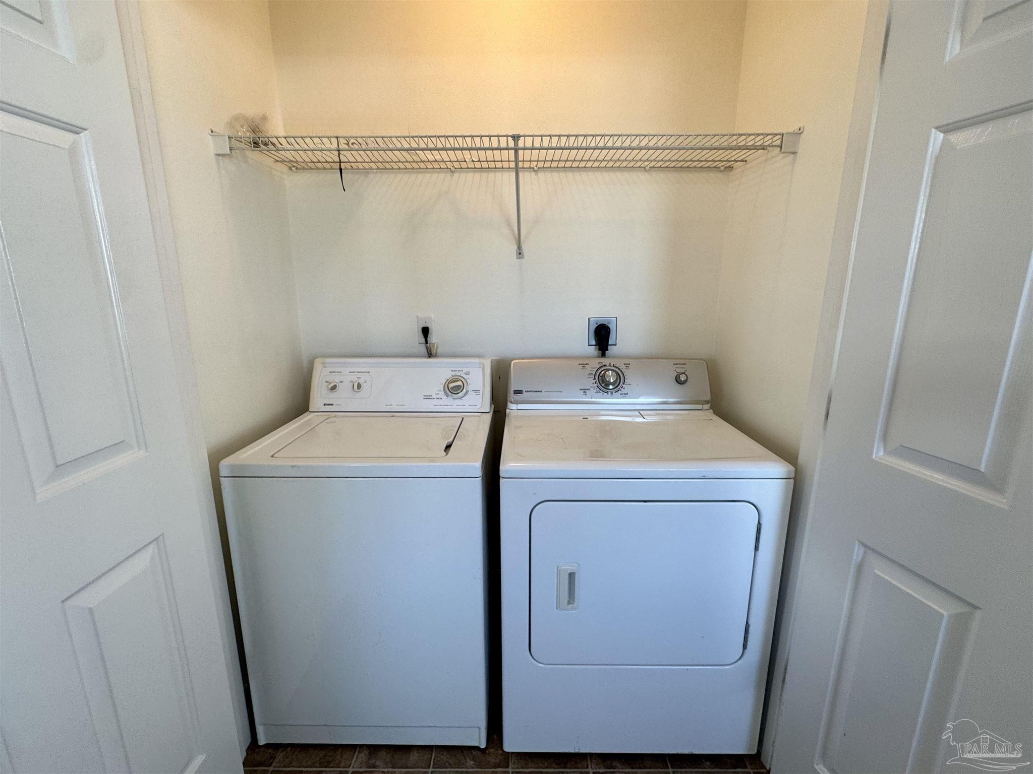 13944 River Road, Unit D Pensacola, FL 32507 - Photo 14 of 14 a utility room with dryer and washer
