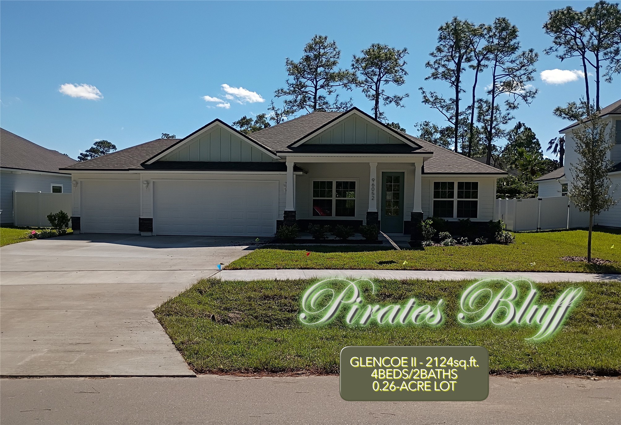 96052 Pirates Bluff Road Yulee, FL 32097 - Photo 1 of 22 a front view of a house with a garden