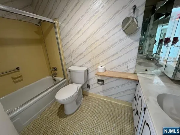 a bathroom with a sink and a toilet