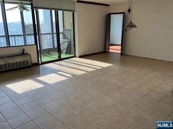 a view of livingroom with furniture and window