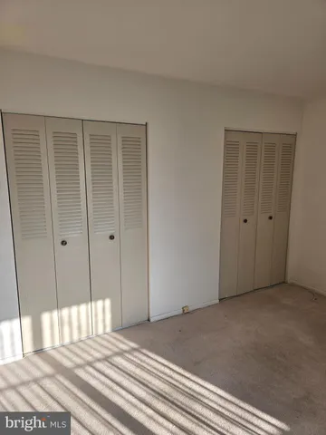 a view of a livingroom with wooden floor