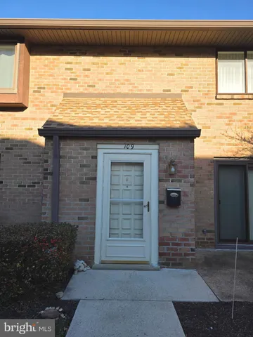 a view of outdoor space and front view of a house